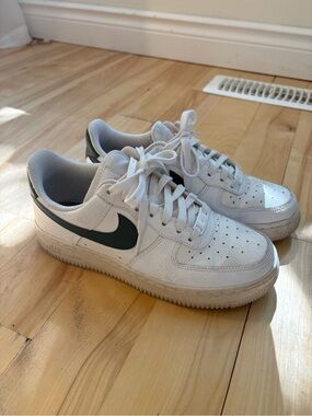 Nike Air Force White Sneakers with Dark Green Swoosh